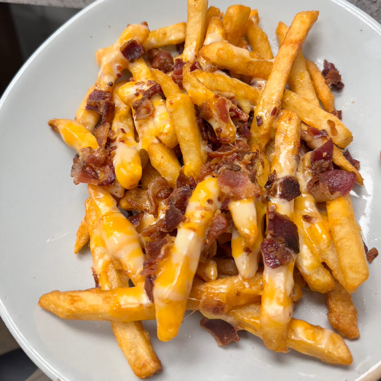 Cheese Fries With Chopped Bacon.